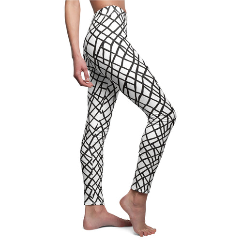 Women’s leggings with black abstract grid lines on white, full-length skinny fit