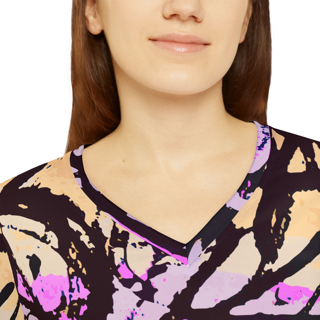 Women’s abstract print v-neck long-sleeve shirt neckline detail with purple and teal accents