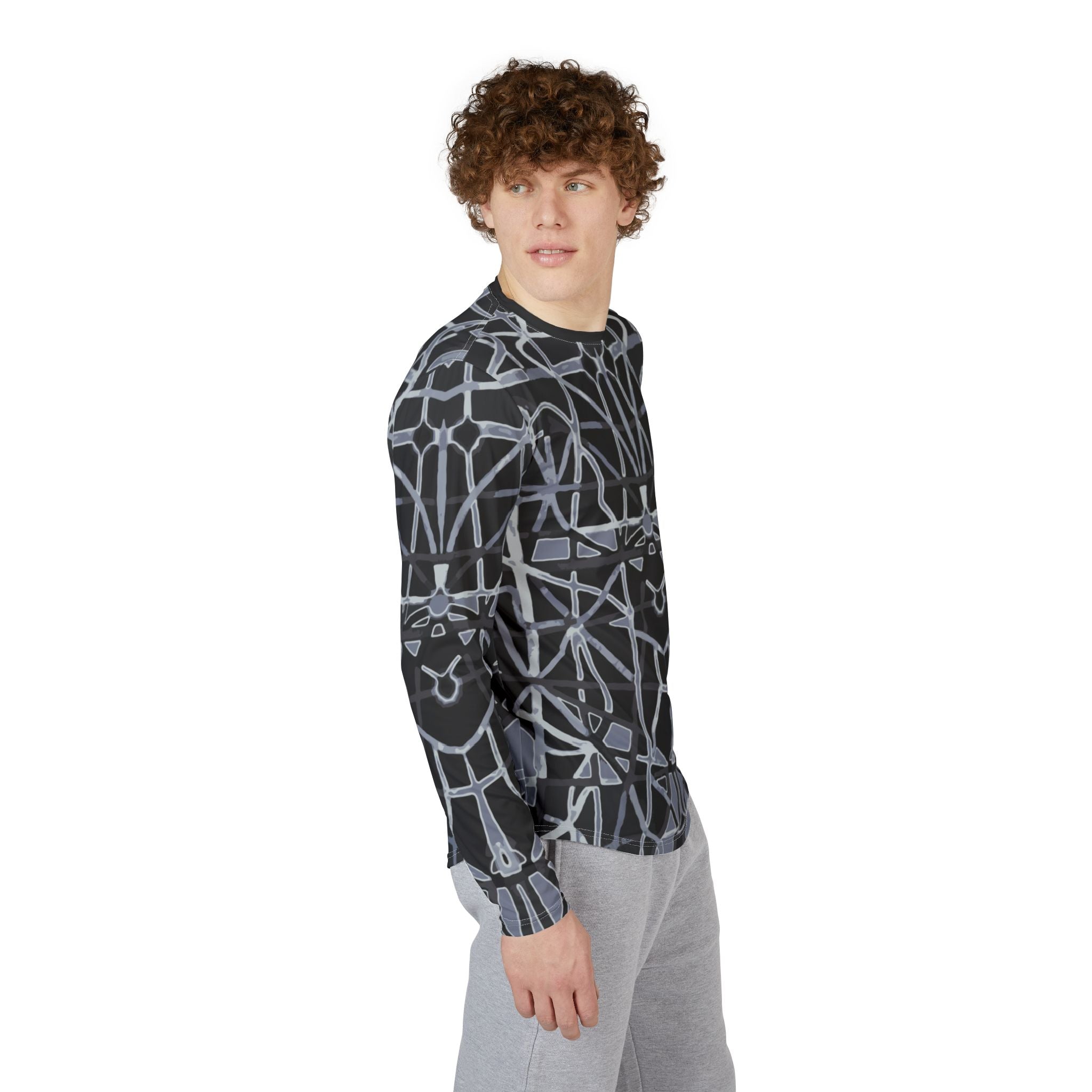 Men's long sleeve UV shirt, black with geometric line print, side profile on model.