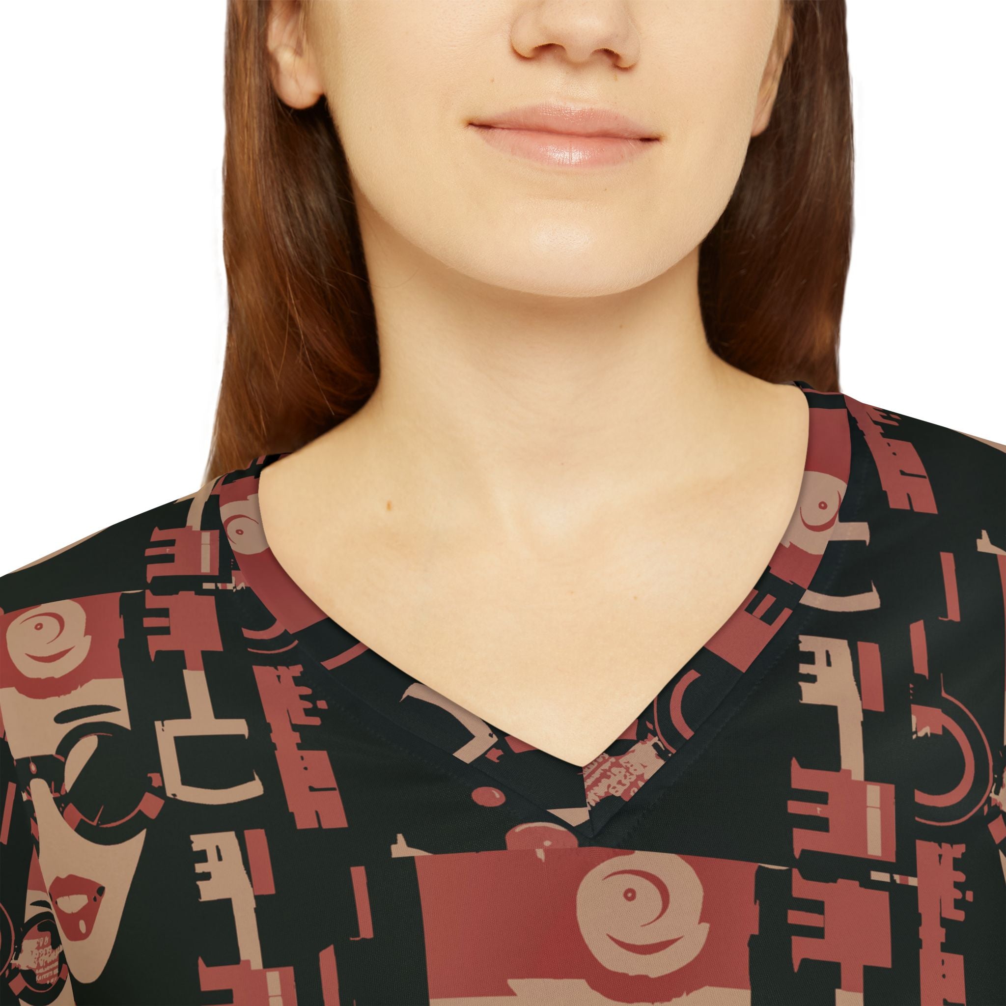 Women's V-neck long sleeve top neckline close-up with face and sunglasses print.