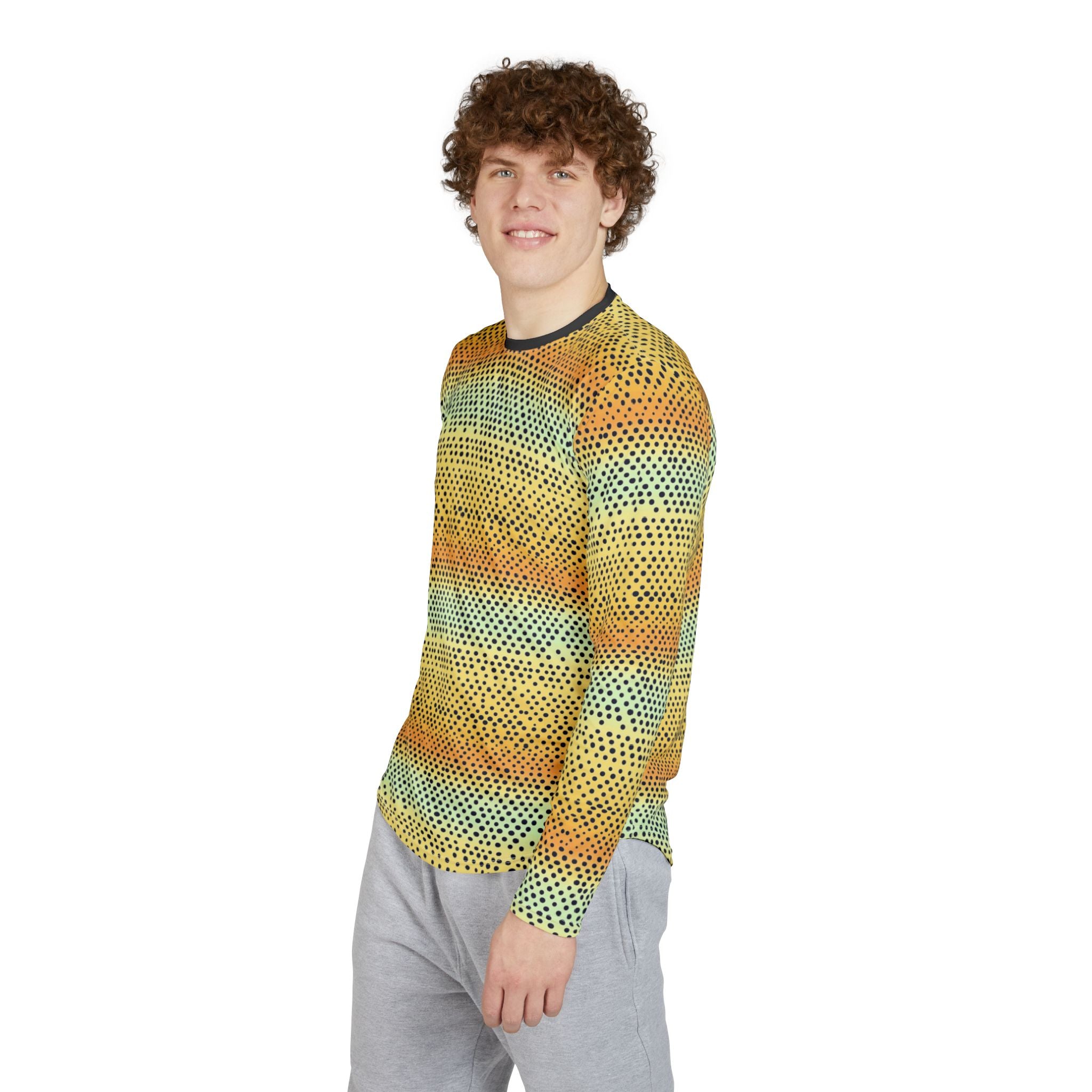 Long-sleeve crew shirt on model side view: yellow and teal dotted gradient pattern
