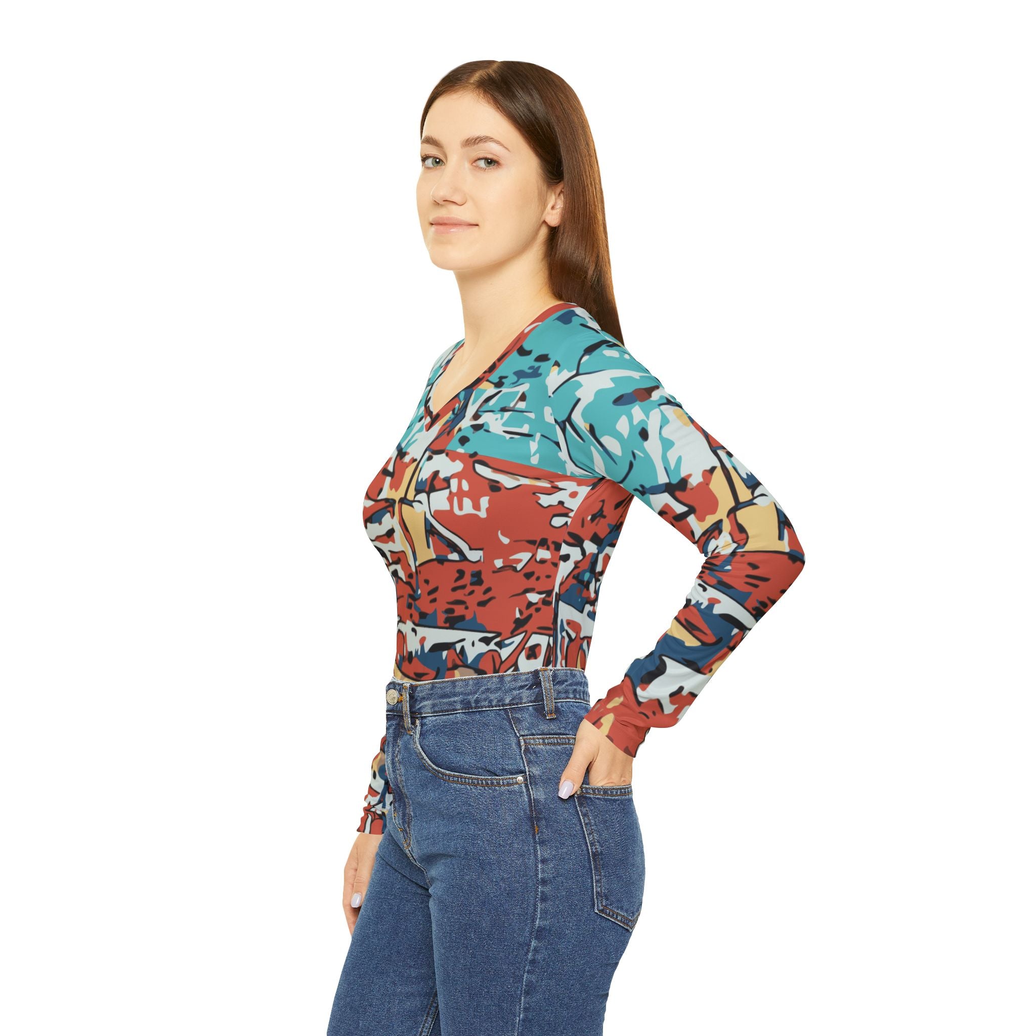 Side view of women’s V-neck long-sleeve abstract coastal print top in teal and red
