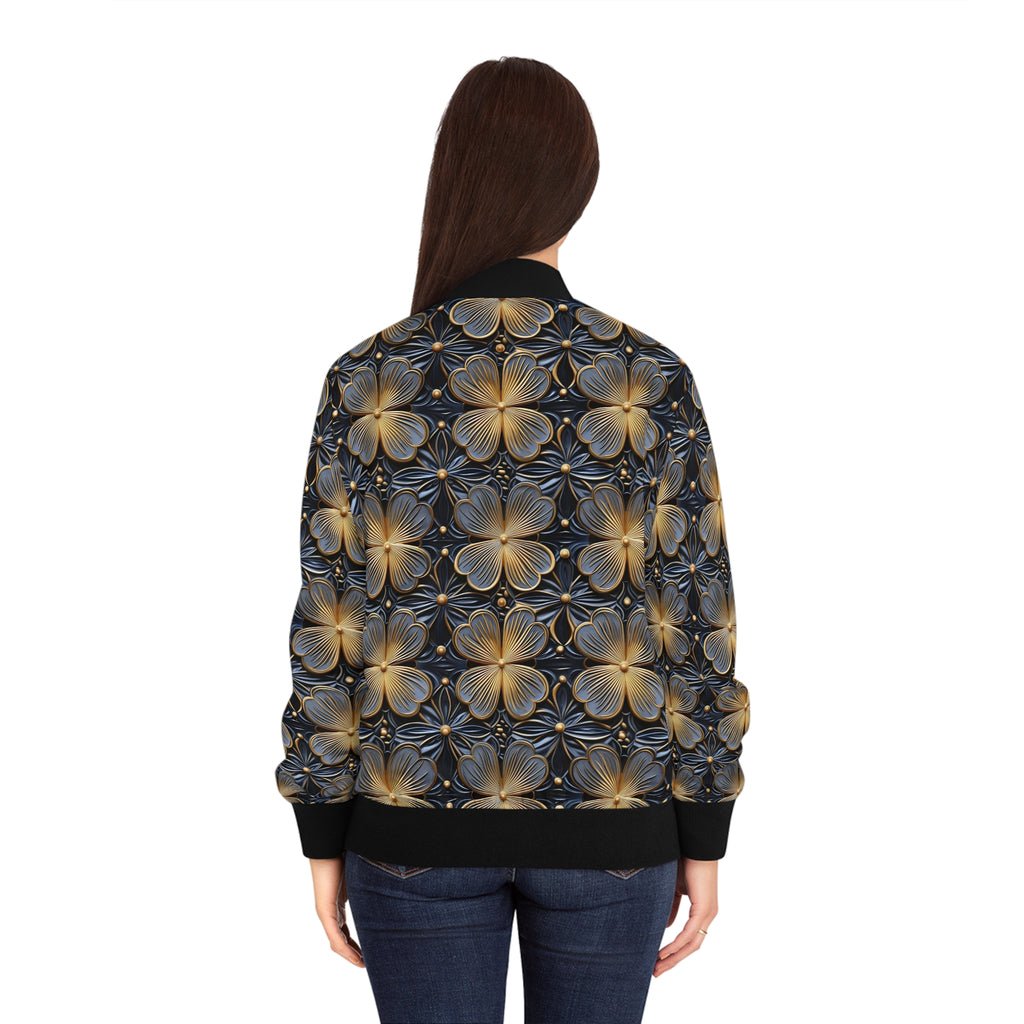 Women's bomber jacket back view on model; all-over gold floral print, ribbed cuffs and hem