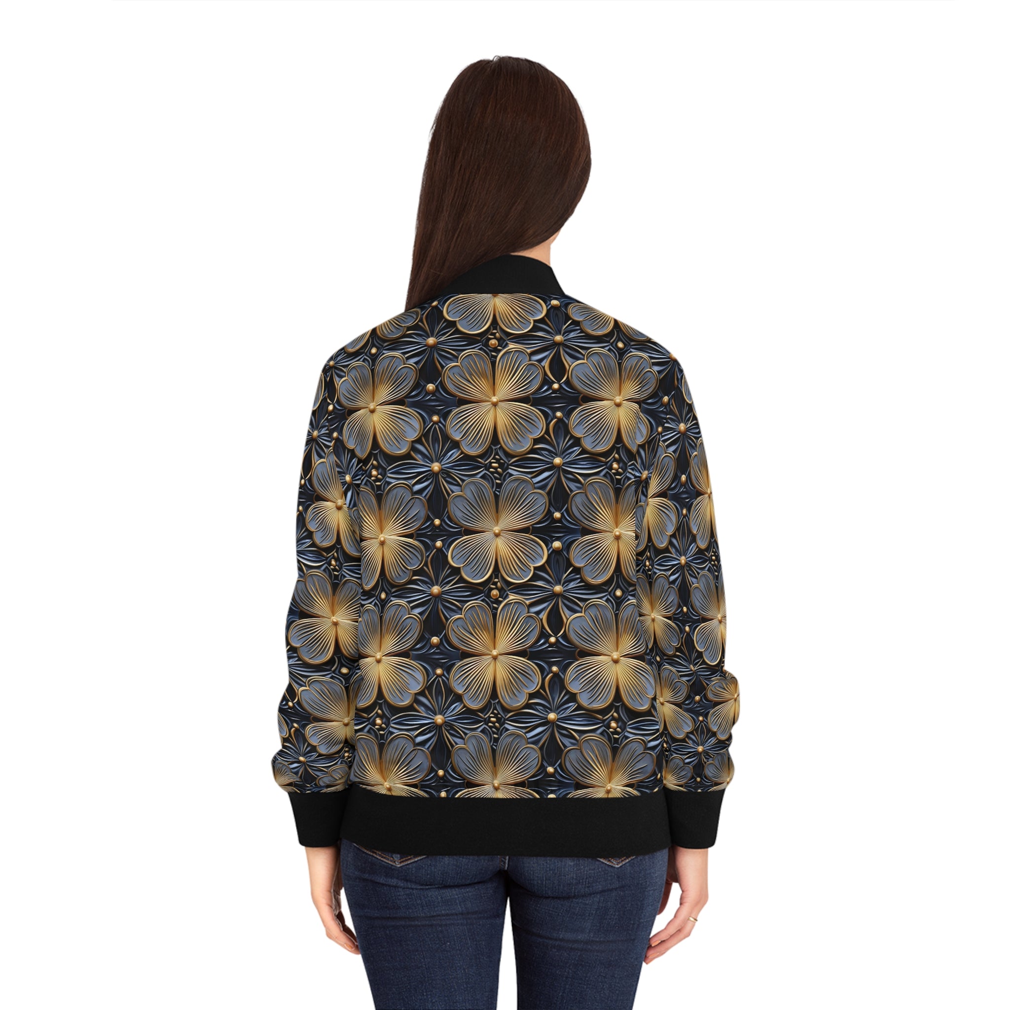 Women's bomber jacket back view on model; all-over gold floral print, ribbed cuffs and hem