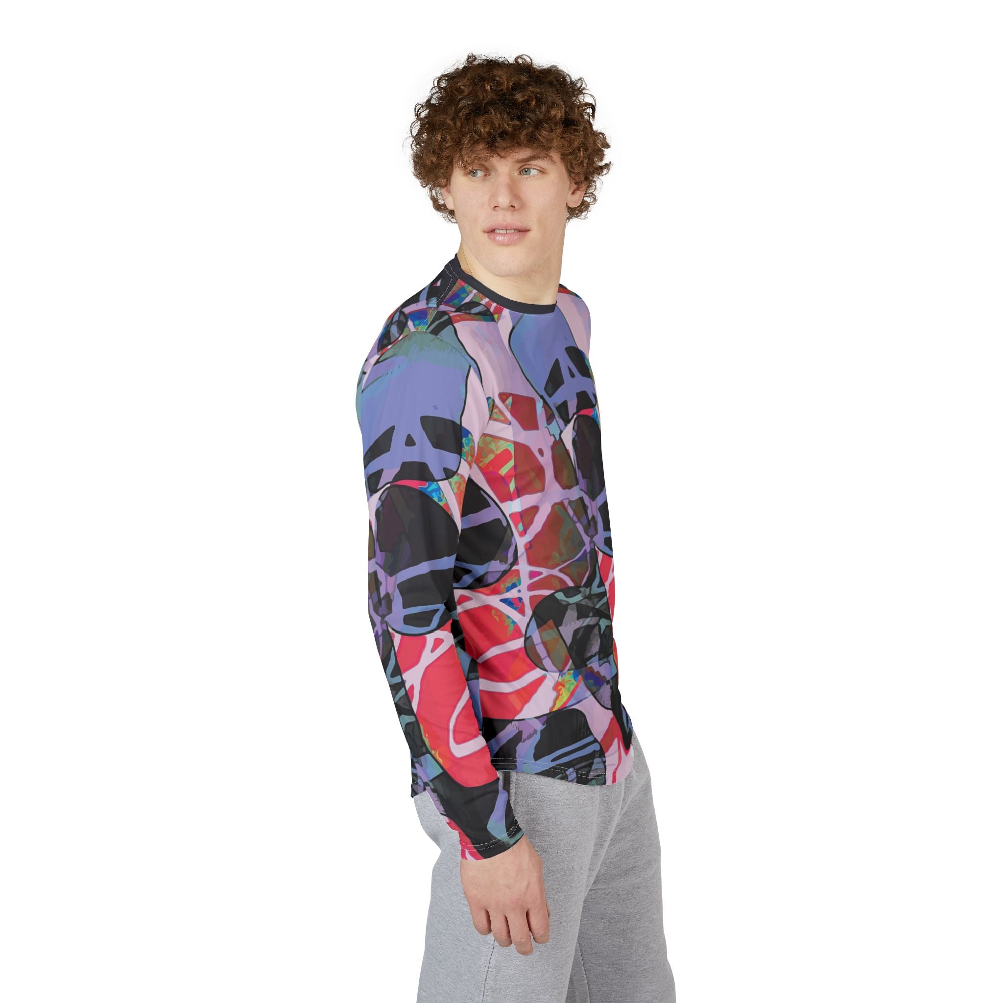 Men's UPF 50+ long-sleeve rash guard shirt, angled side view, abstract graffiti print