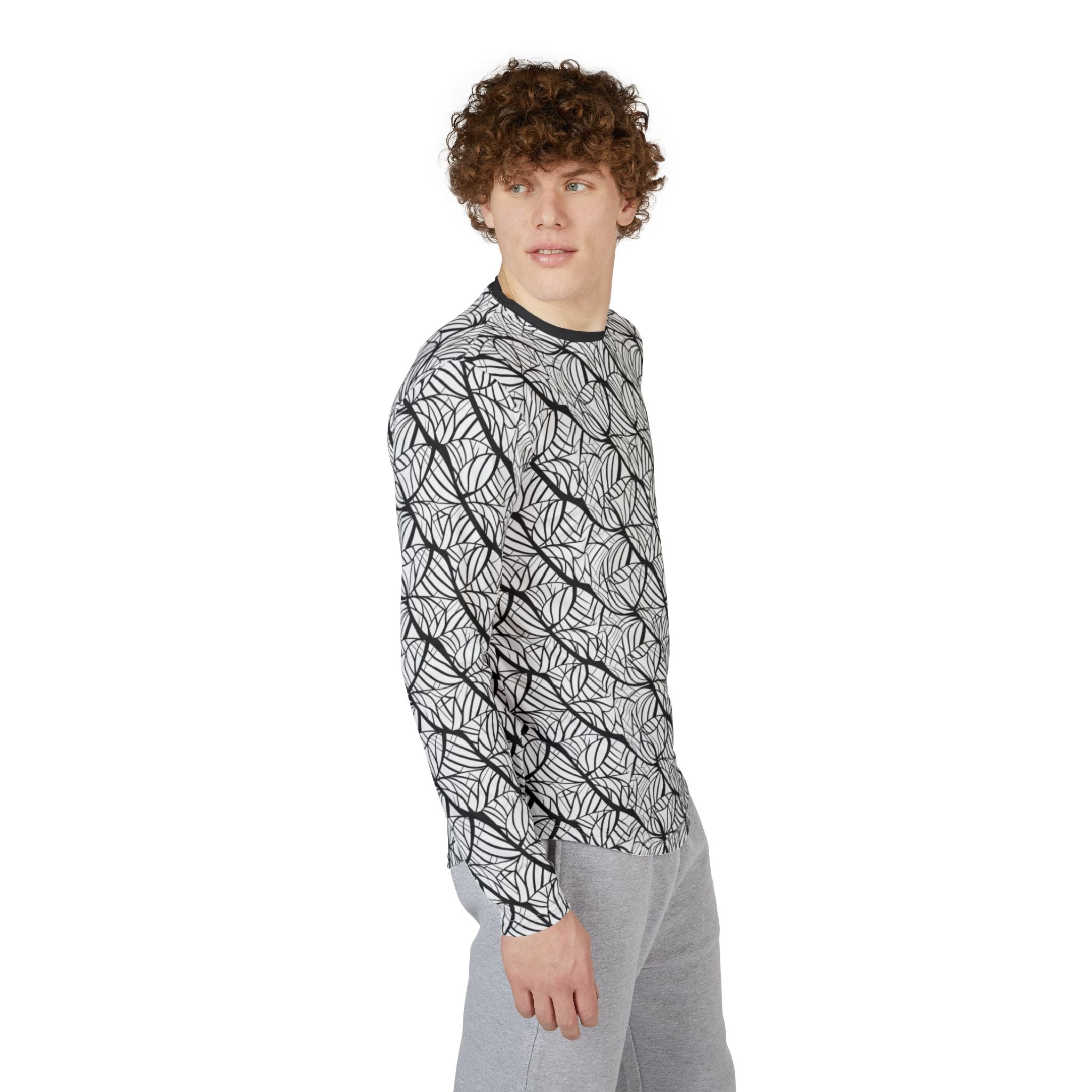 Long-sleeve sun shirt angled view with black leaf pattern on white, crew neck