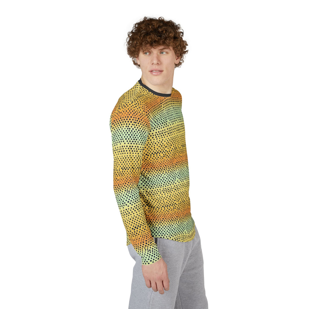 Long-sleeve crew shirt on model angled view: yellow with teal dotted gradient, dark trim