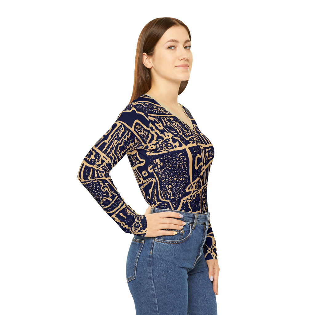 Women’s patterned long-sleeve top with navy V-neck and beige abstract blocks