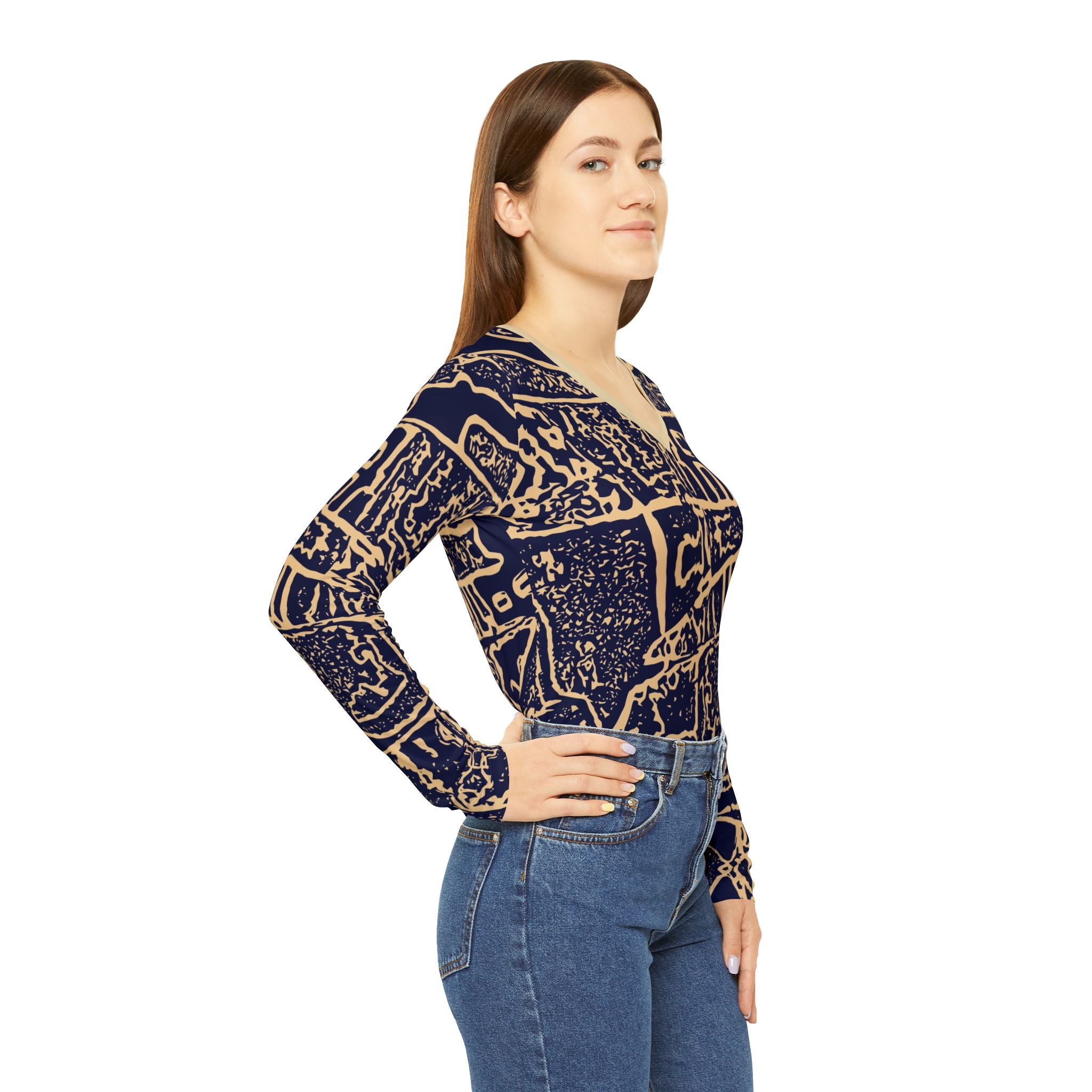 Women’s patterned long-sleeve top with navy V-neck and beige abstract blocks