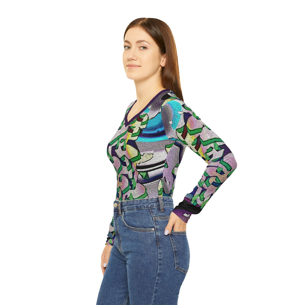 Women's long-sleeve V-neck shirt side view on model with abstract print in purple, green, blue