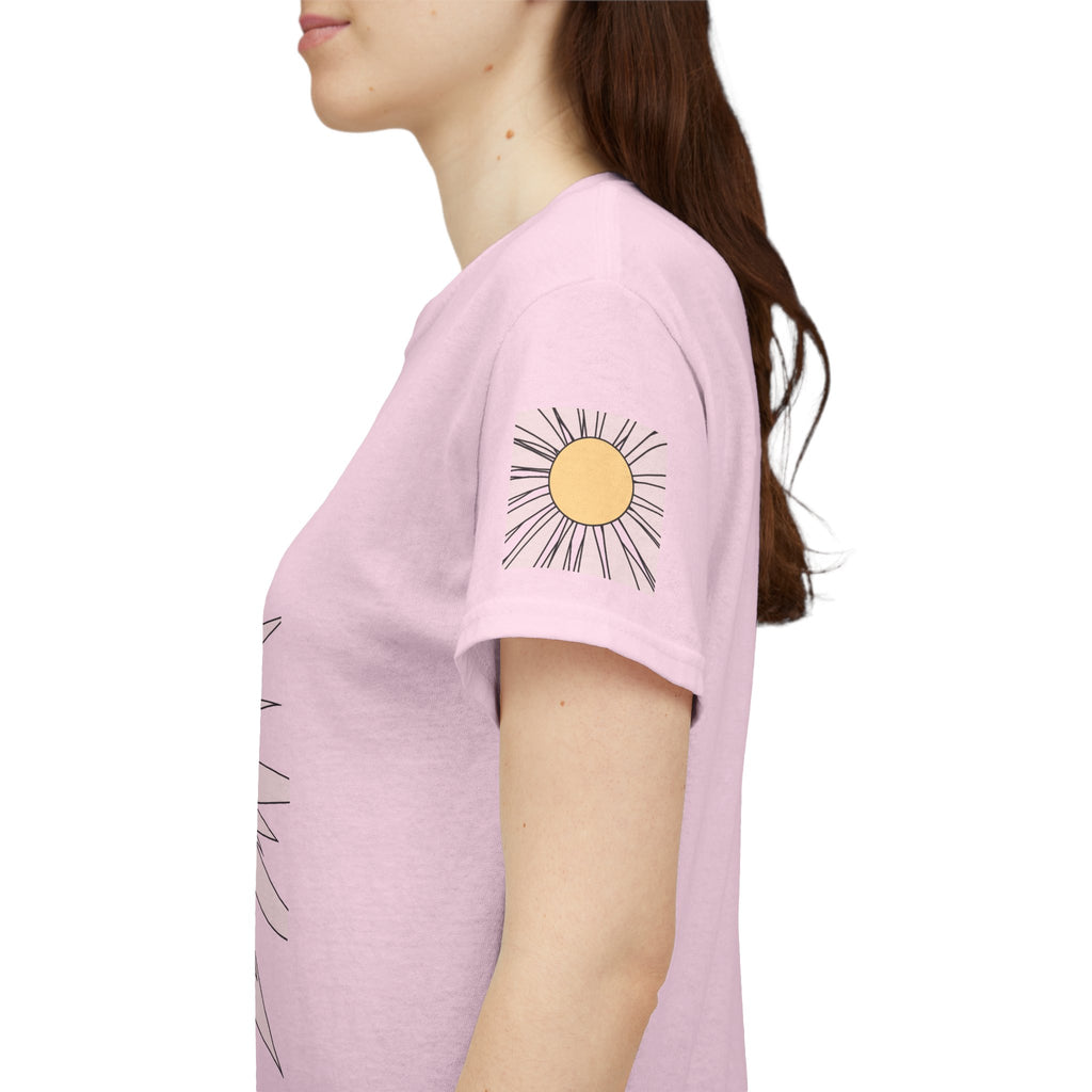 Light pink tee sleeve detail with small daisy graphic and curved neckline