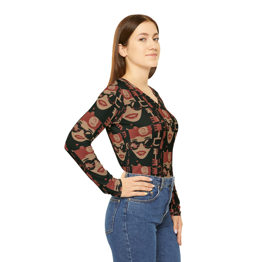 Women's long sleeve top, back and side view, repeating face print and icons.